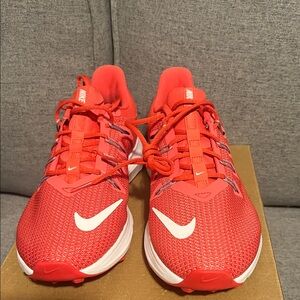 NWT Nike Crimson and White Athletic running Sneakers.